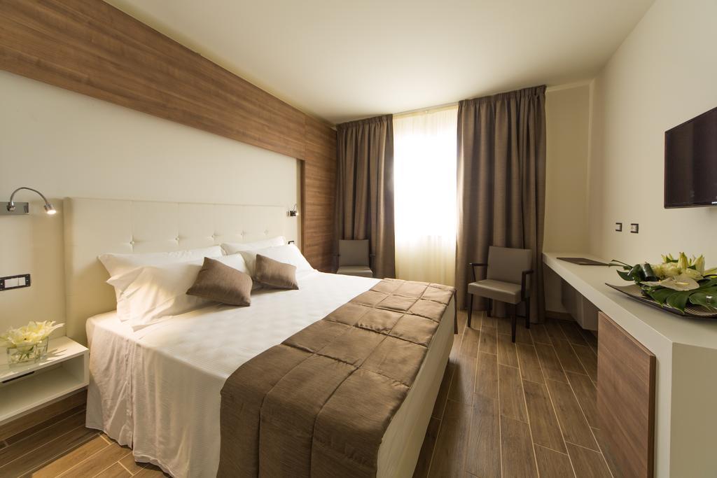 Street Hotel Комаккьо Номер фото