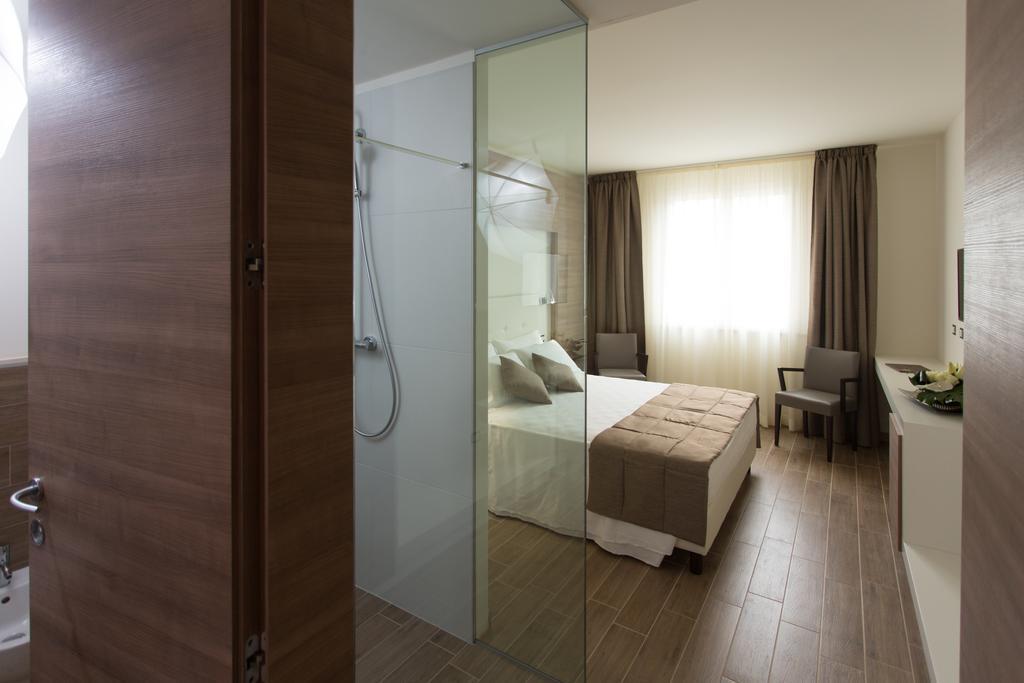 Street Hotel Комаккьо Номер фото